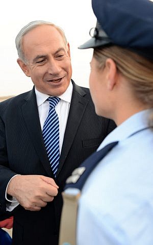 Prime Minister Benjamin Netanyahu chatting with Lt. T, the first religious flight school graduate, on December 27, 2012 (Photo credit: Kobi Gideon/ GPO/ Flash 90)