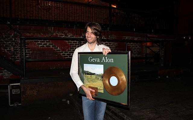 Geva Alon and his newly minted gold record (Courtesy Carmi Wurtman)