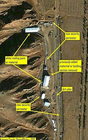 Construction, a new security perimeter, and new roofing on the two major buildings at the Parchin site were captured by an ISIS satellite on Sunday (photo credit: ISIS/AP)