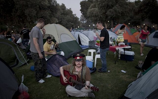 Russian-speaking immigrants gather for a Russian folk music festival in northern Israel. About 2,000 immigrants from the former Soviet Union attended the two-day festival, singing Russian standards, barbecuing and drinking vodka. (photo credit: AP Photo/Oded Balilty) 