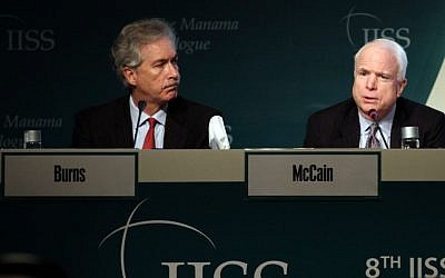 Deputy Secretary of States William Burns, left, and Sen. John McCain, right, answer questions during the International Institute of Strategic Studies (IISS) conference in Manama, Bahrain, in December. (photo credit: AP/Hasan Jamali)