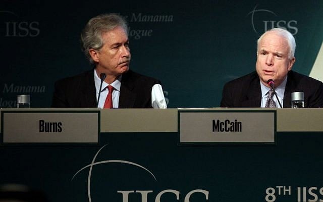 Deputy Secretary of States William Burns, left, and Sen. John McCain, right, answer questions during the International Institute of Strategic Studies (IISS) conference in Manama, Bahrain, in December. (photo credit: AP/Hasan Jamali)