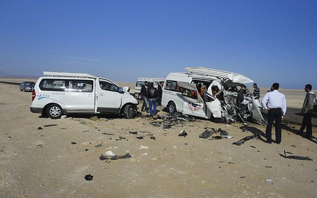 The aftermath of a two-vehicle accident, which left at least five Germans and three Egyptians dead and others injured on the road between Hurghada and Safaga on the Red Sea coast of Egypt on Sunday. (AP) The aftermath of a two-vehicle accident, which left at least five Germans and three Egyptians dead and others injured on the road between Hurghada and Safaga on the Red Sea coast of Egypt on Sunday. (AP)