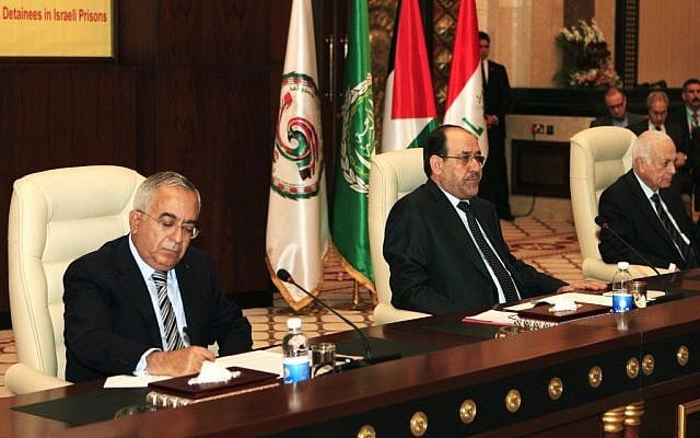 Salam Fayyad (left) Nouri al- Maliki (center) and Nabil Elaraby (right) attend the International conference in solidarity with Palestinian, Arab prisoners and detainees in Israel, in Baghdad last month. (photo credit: AP/Karim Kadim)