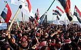 Protesters chant slogans against Iraq's Shiite-led government in Ramadi, 70 miles (115 kilometers) west of Baghdad, Iraq, last December (Photo credit: AP)