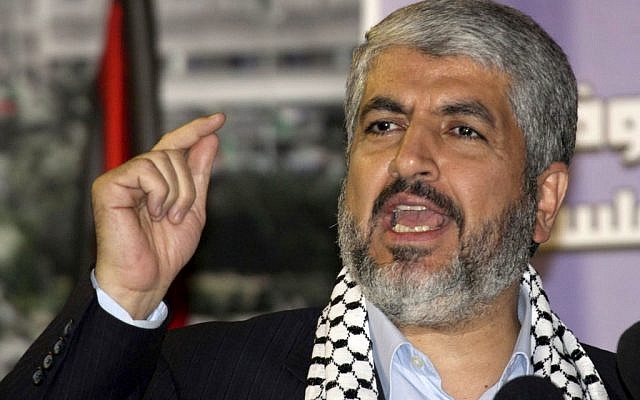 Hamas leader Khaled Mashaal addresses the crowd during a rally at the Yarmouk refugee camp near Damascus, Syria, on Friday Nov. 5, 2010. (photo credit: Bassem Tellawi/AP)