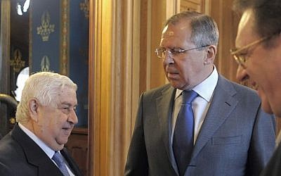 Syrian Foreign Minister Walid Muallem, Russian Foreign Minister Sergey Lavrov, center, and Russian Deputy Foreign Minister Mikhail Bogdanov in Moscow in April 2012 (photo credit: AP)
