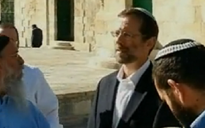 Moshe Feiglin (in black jacket, second from right) on the Temple Mount in December (photo credit: screen capture/Channel 10)