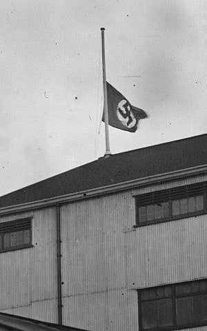 Despite its large Jewish fan base, the Tottenham Hotspur soccer club raised a swastika above its home field for a 1935 game against Germany. (Popperfoto/Getty Images)