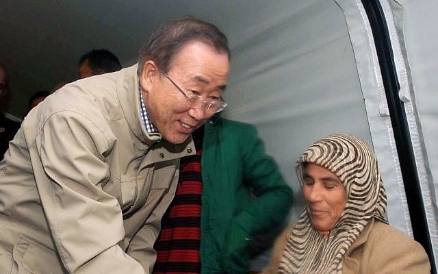 UN chief Ban Ki-moon visits Syrian refugees at a camp in Islahiye, near the Syrian border, in Turkey, Friday. (photo credit: AP Photo/Veli Gurgah)