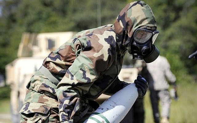 US soldiers train for chemical warfare (photo credit: Marv Lynchard/US Department of Defense/File)