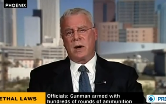 Michael Harris speaks on Iranian Press TV. (photo credit: image capture from YouTube video uploaded by Press TV) Michael Harris speaks on Iranian Press TV. (photo credit: image capture from YouTube video uploaded by Press TV)