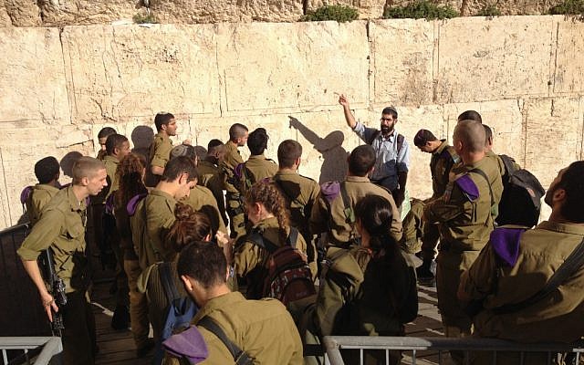 David Kohelet speaking to the soldiers just beneath the Mughrabi Gate to the Temple Mount (Photo credit: Mitch Ginsburg/ Times of Israel) David Kohelet speaking to the soldiers just beneath the Mughrabi Gate to the Temple Mount (Photo credit: Mitch Ginsburg/ Times of Israel)