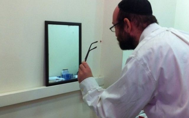 A man tries on a pair of glasses at IsraelOptical's pop-up store in the Rav Shefa Mall (Photo credit: Courtesy) A man tries on a pair of glasses at IsraelOptical's pop-up store in the Rav Shefa Mall (Photo credit: Courtesy)