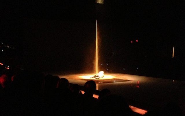A Kibbutz Dance company performer introducing the Obersons' collection (photo credit: Jessica Steinberg/Times of Israel)