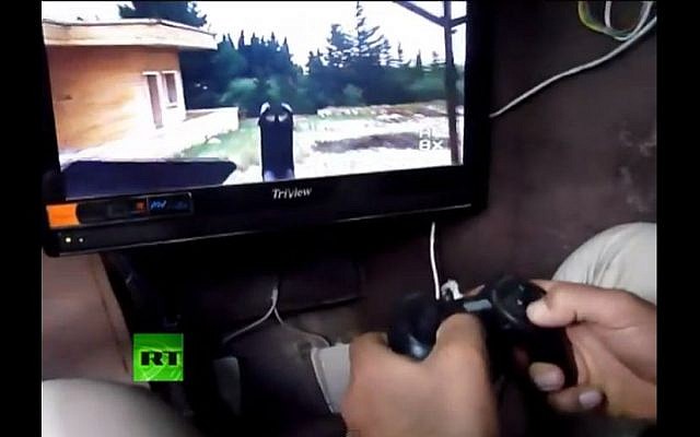 Inside the Syrian rebel armored vehicle (photo credit: screen capture Russia Today/Youtube) Inside the Syrian rebel armored vehicle (photo credit: screen capture Russia Today/Youtube)