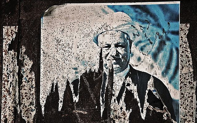A poster depicting former Iranian president Akbar Hashemi Rafsanjani (photo credit: CC BY-SA Ali Ghazvini, Flickr)