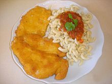 Schnitzel and orzo (or in this case, pasta), is often the carb-filled lunch of choice at Israeli schools (photo credit: Aviad Bublil/CCA-SA)