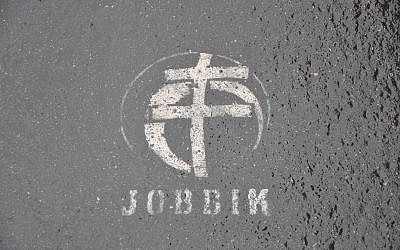 Graffiti in Budapest of the Jobbik party's logo and name. (photo credit: CC BY-SA Aloriel, Flickr)