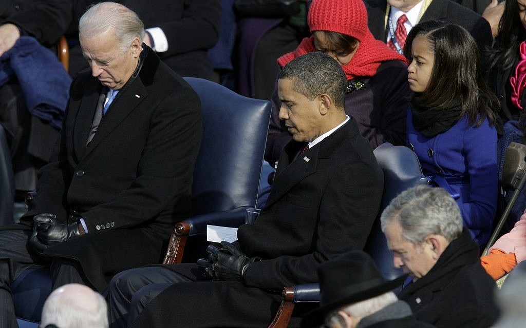 Vice President-elect Joe Biden, President-elect Barack Obama and President George W. Bush, left to right, bow their heads during the invocation at the beginning of the swearing-in ceremony at the U.S. Capitol in Washington, Tuesday, Jan. 20, 2009 (photo credit: AP/Jae C. Hong) Vice President-elect Joe Biden, President-elect Barack Obama and President George W. Bush, left to right, bow their heads during the invocation at the beginning of the swearing-in ceremony at the U.S. Capitol in Washington, Tuesday, Jan. 20, 2009 (photo credit: AP/Jae C. Hong)