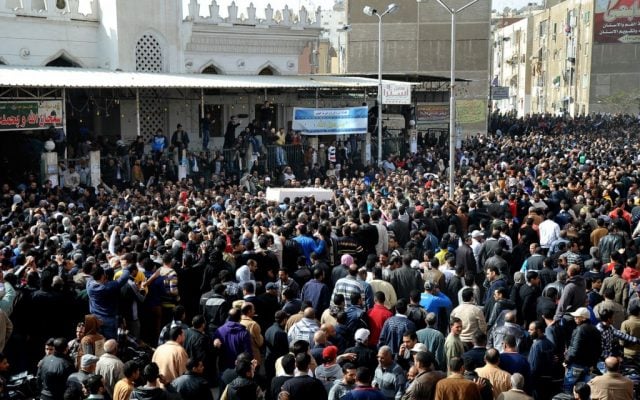 Egyptians carry the coffin of a man killed during a mass funeral in Port Said, Egypt, Sunday, January 27, 2013. Tens of thousands of mourners poured into the streets of the restive Egyptian city of Port Said on Sunday for a funeral for most of the 37 people killed in rioting a day earlier, chanting slogans against Islamist President Mohammed Morsi. (photo credit: AP) Egyptians carry the coffin of a man killed during a mass funeral in Port Said, Egypt, Sunday, January 27, 2013. Tens of thousands of mourners poured into the streets of the restive Egyptian city of Port Said on Sunday for a funeral for most of the 37 people killed in rioting a day earlier, chanting slogans against Islamist President Mohammed Morsi. (photo credit: AP)