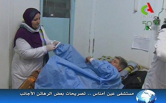 An unidentified rescued hostage receives treatment in a hospital in Ain Amenas, Algeria. (AP Photo/Canal Algerie via Associated Press TV)