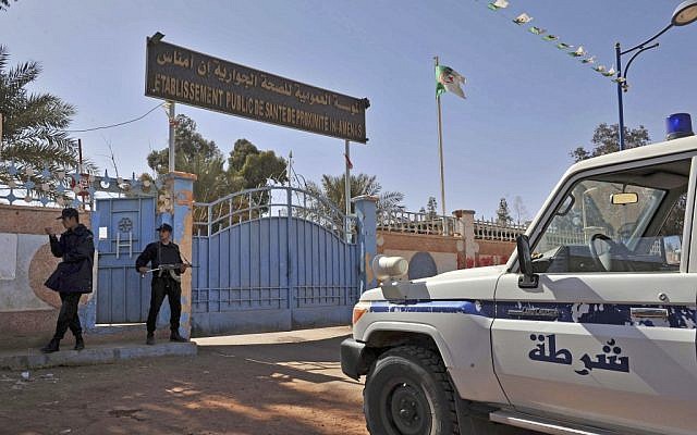 Algerian special police unit officers guard the entrance of an hospital located near the gas plant where hostages were kidnapped by Islamic militants, in Ain Amenas, Saturday, January 19, 2013 (photo credit: AP/Anis Belghoul) Algerian special police unit officers guard the entrance of an hospital located near the gas plant where hostages were kidnapped by Islamic militants, in Ain Amenas, Saturday, January 19, 2013 (photo credit: AP/Anis Belghoul)