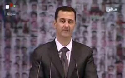Bashar Assad delivers a speech to the Syrian nation, January 6. (photo credit: YouTube screenshot/Syrian TV)