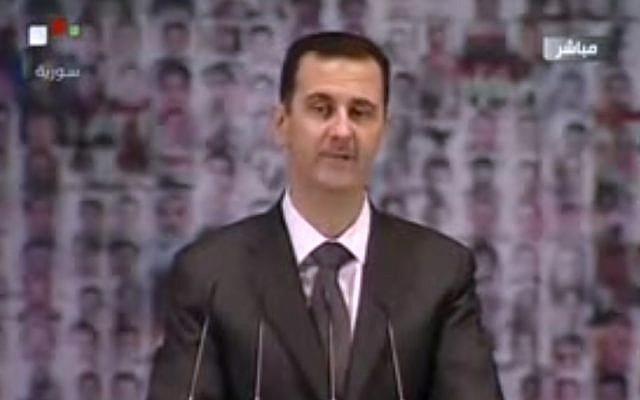 Bashar Assad delivers a speech to the Syrian nation, January 6. (photo credit: YouTube screenshot/Syrian TV) Bashar Assad delivers a speech to the Syrian nation, January 6. (photo credit: YouTube screenshot/Syrian TV)