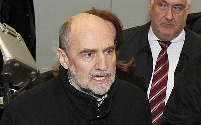 Herman Nackaerts, Deputy Director General and Head of the Department of Safeguards of the International Atomic Energy Agency (IAEA), talks to media after his arrival from Iran at Vienna's Schwechat airport, Austria, Friday. (AP Photo/Ronald Zak)