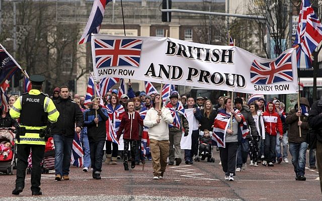 Protestant Loyalist protestors converge on Belfast city hall Saturday Jan. 5, 2013. Ongoing protests and demonstrations continue at the removal of the Union flag from the Belfast city hall. (photo credit: AP/Paul Faith) Protestant Loyalist protestors converge on Belfast city hall Saturday Jan. 5, 2013. Ongoing protests and demonstrations continue at the removal of the Union flag from the Belfast city hall. (photo credit: AP/Paul Faith)