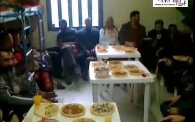 Palestinian security prisoners hold an engagement party in prison. (screen capture: Youtube/HakolHayehudi)