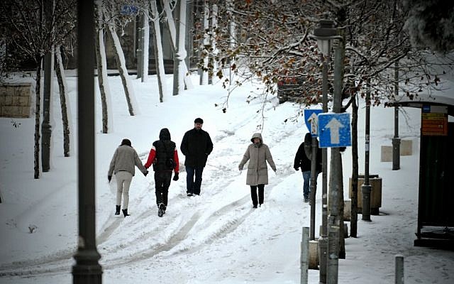 People trudging through the capital. (photo credit: Courtesy/David Katz)