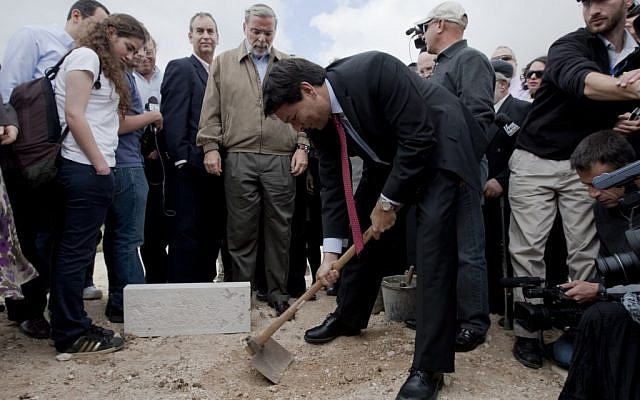 Danon lays a symbolic cornerstone for new Jewish construction in east Jerusalem, November, 2009. Settlements, Danon says, "are not an obstacle to peace" (Flash90)