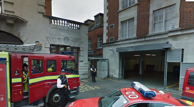 Police officers guard the entrance to the Israeli Embassy in London (image capture Google Street Views)