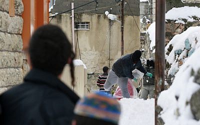 Israeli and Palestinian teenagers have a snowball fight in Hebron in 2008 (photo credit: Olivier Fitoussi/Flash90) Israeli and Palestinian teenagers have a snowball fight in Hebron in 2008 (photo credit: Olivier Fitoussi/Flash90)