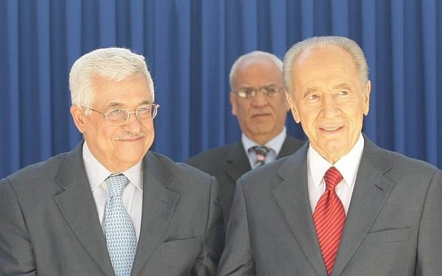 President Shimon Peres with Palestinian Authority President Mahmoud Abbas in 2008. Standing behind them is PA negotiator Saeb Erekat. (photo credit: Kobi Gideon/Flash90) President Shimon Peres with Palestinian Authority President Mahmoud Abbas in 2008. Standing behind them is PA negotiator Saeb Erekat. (photo credit: Kobi Gideon/Flash90)