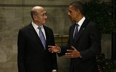 Ehud Olmert (left) and Barak Obama (right) in Jerusalem, 2008 (photo credit: Olivier Fitoussi/Flash90)
