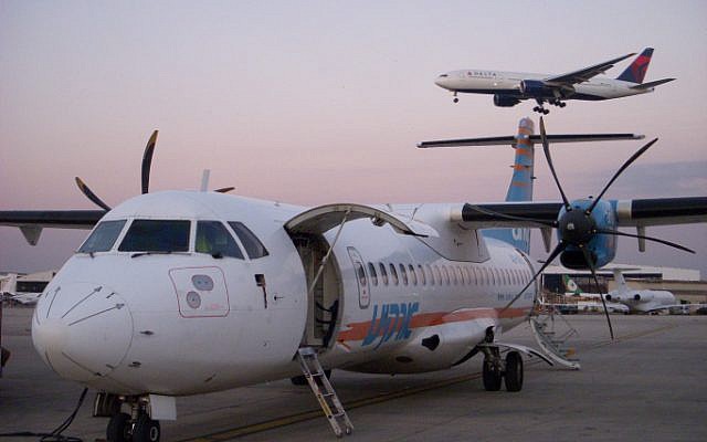 An illustrative photo of a plane landing at Ben Gurion Airport. (photo credit: Tsahi Ben-Ami / Flash 90)