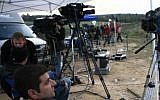 Illustrative: Journalists for al-Arabiya on the border of the Gaza Strip (Nati Shohat/Flash90)