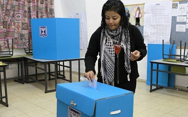 An Arab Israeli woman casts her vote at a polling station in the Arab village of Abu Ghosh in 2009. (photo credit: Nati Shohat/Flash90) An Arab Israeli woman casts her vote at a polling station in the Arab village of Abu Ghosh in 2009. (photo credit: Nati Shohat/Flash90)