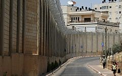 Illustrative photo of a section of the security barrier in Jerusalem's Beit Hanina neighborhood in 2009. (photo credit: Kobi Gideon/Flash90)