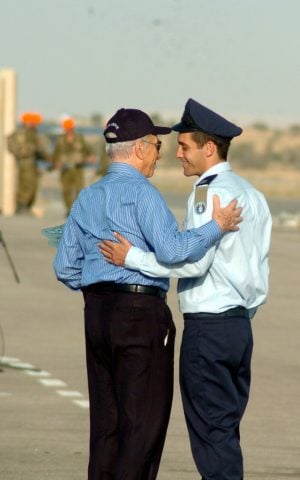 Asaf Ramon, left, with Presdient Shimon Peres upon his graduation at Hatzerim air force base in June 2009, several months before he was killed. (photo credit: Dudu Greenspan/Flash90)