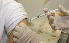 An illustrative photo of a patient receiving an injection. (photo credit: Miriam Alster/Flash90/File)