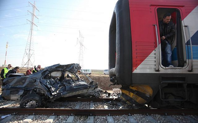 A train collided with a car near kibbutz Gat on December 27, 2009 (photo credit: Dov Biladi/ZAKA Spokesperson/Flash90)