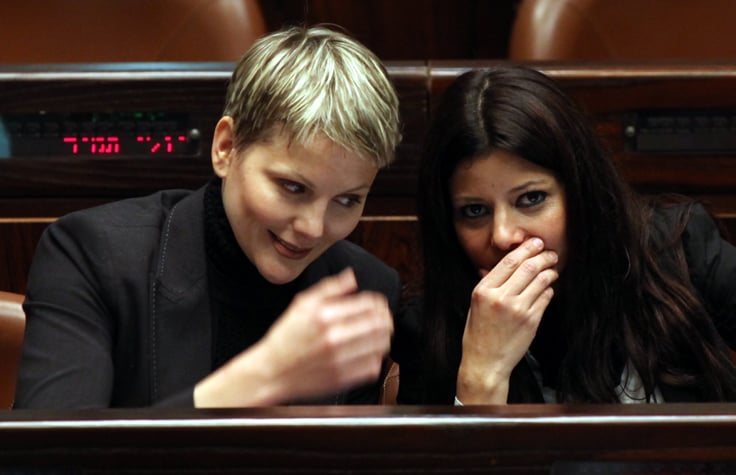 Yisrael Beytenu Knesset members Anastasia Michaeli and Orly Levy-Abekasis share a giggle during a Knesset session, February 2010 (photo credit: Yossi Zamir/Flash 90)