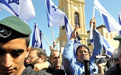 Right-wing protesters, including Itamar Ben Gvir (in blue), march through Jaffa on March 2, 2011. (photo credit: Yossi Zeliger/Flash90)