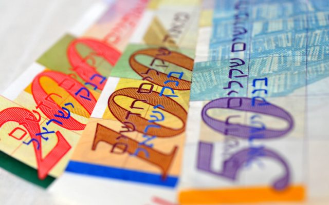 Illustrative photo of Israeli shekels. (Sophie Gordon/Flash90)