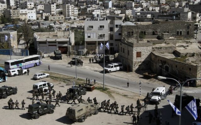 Israeli security forces in Hebron, April 2012 (photo credit: Miriam Alster/Flash90)