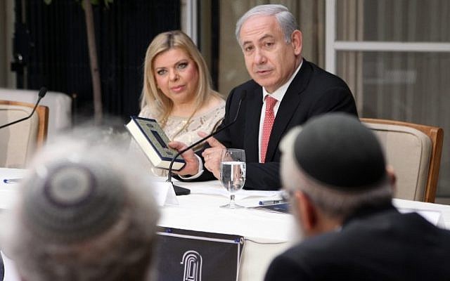 Benjamin Netanyahu and his wife Sara host rabbis and scholars at their home for a Bible study session in October 2013. (Marc Israel Sellem/Flash90)